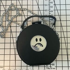 delias frowny chain crossbody bag